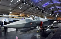 visitors stand next to a prototype of the advanced medium combat aircraft amca india s most advanced stealth fighter jet at the aero india 2025 air show at yelahanka air base in bengaluru india february 11 2025 reuters