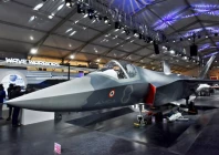 visitors stand next to a prototype of the advanced medium combat aircraft amca india s most advanced stealth fighter jet at the aero india 2025 air show at yelahanka air base in bengaluru india february 11 2025 reuters