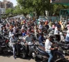 people queue to fill petrol in their two wheelers with concerns over potential supply disruptions but authorities say there are no shortages amid the ongoing us israeli conflict with iran in ahmedabad india march 23 2026 photo reuters