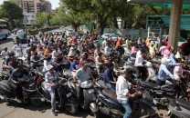 india cuts excise duties on petrol diesel as global oil prices surge