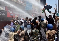students gesture as police use water cannons to disperse them during a protest demanding cancellation of a civil services recruitment examination over allegations of question paper leaks and other irregularities in patna india august 25 2026 reuters