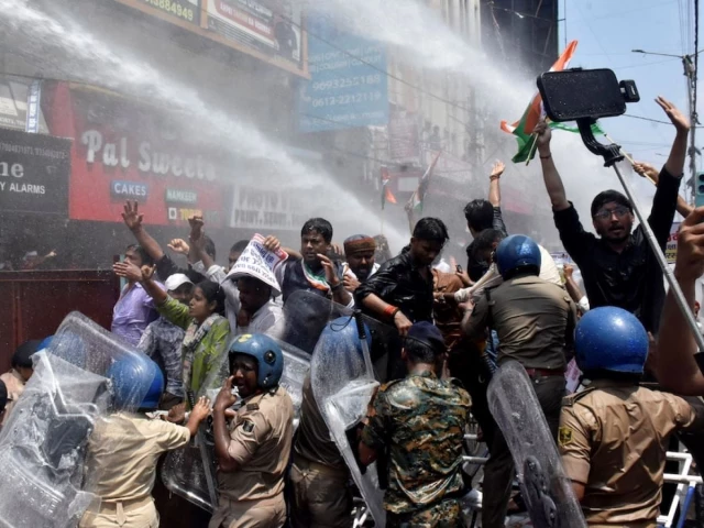 students gesture as police use water cannons to disperse them during a protest demanding cancellation of a civil services recruitment examination over allegations of question paper leaks and other irregularities in patna india august 25 2026 reuters students gesture as police use water cannons to disperse them during a protest demanding cancellation of a civil services recruitment examination over allegations of question paper leaks and other irregularities in patna india august 25 2026 reuters