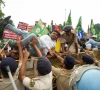 a demonstrator tries to climb through a barricade during a protest organized by opposition parties demanding the resignation of chief election commissioner gyanesh kumar in patna india october 8 2026 reuters