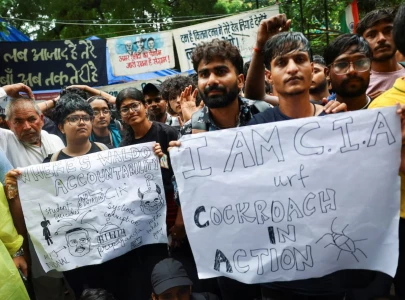 indian exam protest forces parliament suspension adding pressure on pm modi