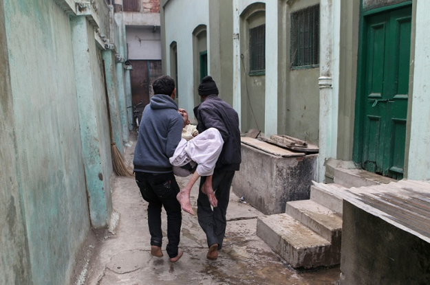 Some 20 men and women each month come to India from around the world to finish their days at Varanasi's 'Death Hotel', a tired old red colonial-era building with 12 sparse concrete floor rooms. PHOTO AFP