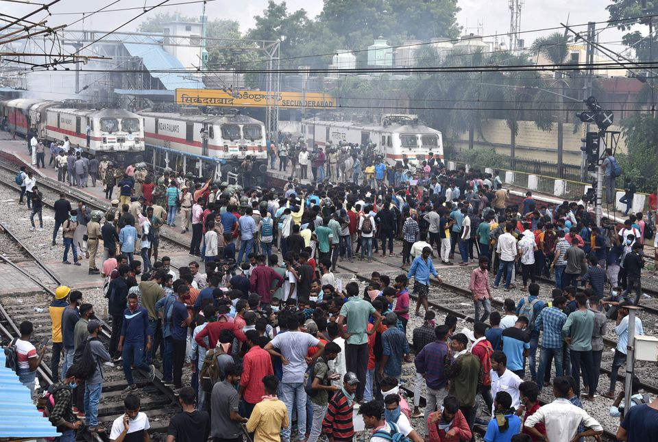 Protestors block railway tracks during a protest against 