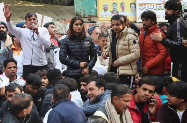 vinesh phogat sakshi malik bajrang punia and other indian wrestlers take part in a protest demanding the disbandment of the wfi and the investigation of its head by the police who they accuse of sexually harassing female players at jantar mantar in new delhi india january 19 2023 reuters anushree fadnavis