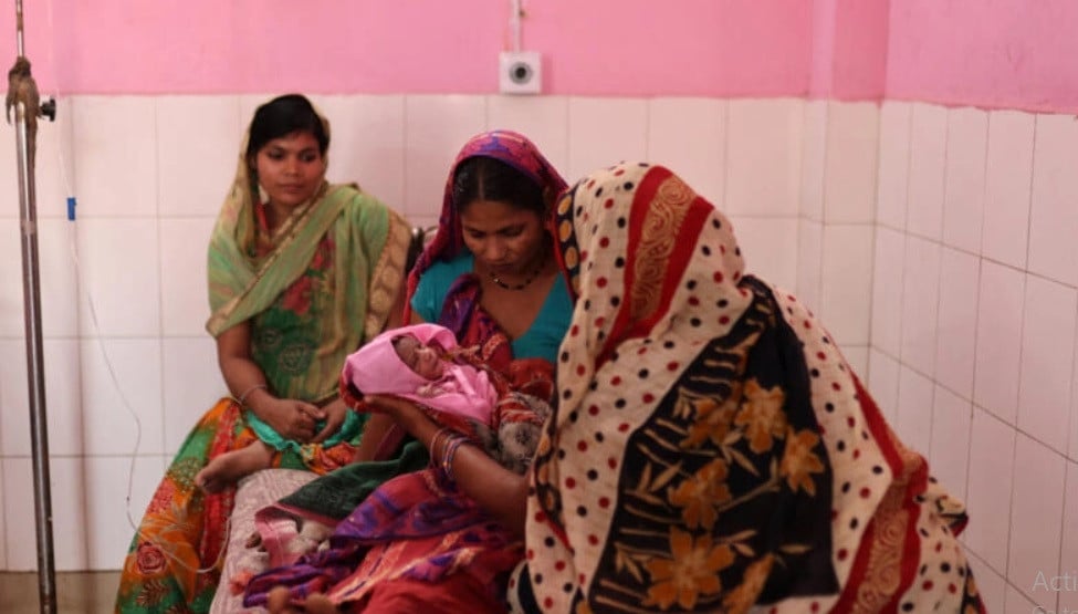 zamerun nisha 33 holds her newborn baby as her sister sanerum 38 and her sister in law zabinad 15 keep her company at the maternity ward of a community health centre in bahadurganj subdivision of kishanganj district in the state of bihar india march 21 2023 anushree fadnavis reuters