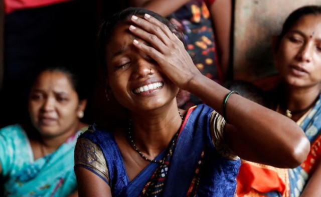 women mourn the death of their relatives after a landslide hit a village in raigad in the western indian state of maharashtra india july 20 2023 reuters francis mascarenhas women mourn the death of their relatives after a landslide hit a village in raigad in the western indian state of maharashtra india july 20 2023 reuters francis mascarenhas