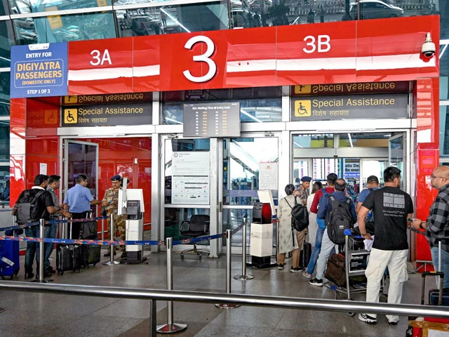 flight passengers align at security check points in the indira gandhi international airport new delhi photo afp flight passengers align at security check points in the indira gandhi international airport new delhi photo afp
