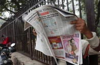 a man reads the latest edition of the times of india newspaper with the story on u s tariffs on indian imports slashed to 18 in new delhi india february 3 2026 photo reuters bhawika chhabra