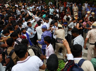 police cane supporters of india s cockroach movement as thousands gather for march police cane supporters of india s cockroach movement as thousands gather for march