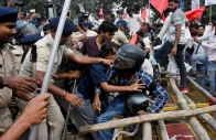 police personnel scuffle with protesters who crossed the barricades during a protest by the all india students association demanding the resignation of india s chief election commissioner gyanesh kumar in patna india october 13 2026 photo reuters