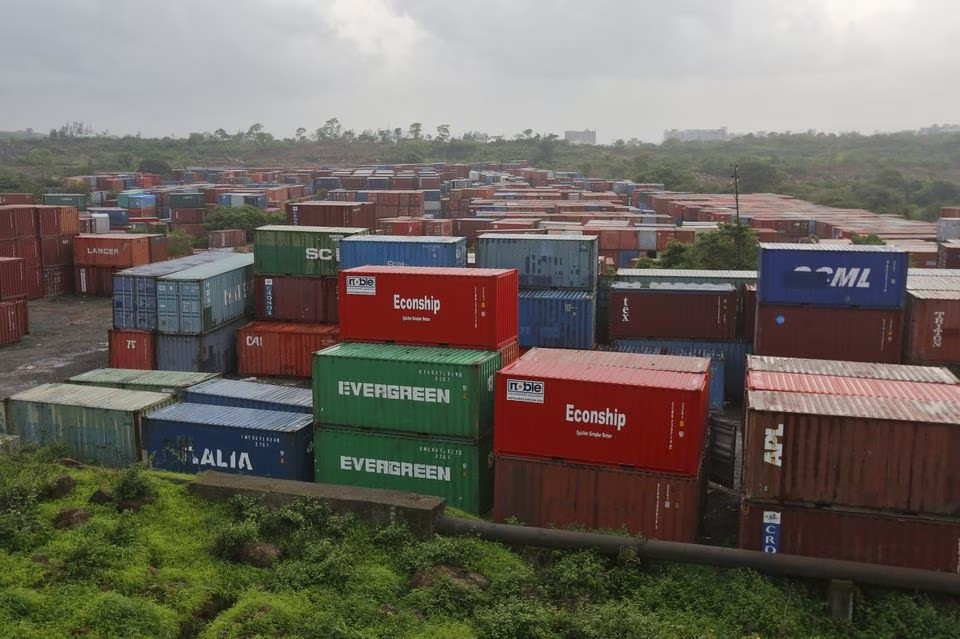 cargo containers are seen stacked outside the container terminal of jawaharlal nehru port trust jnpt in mumbai india july 15 2015 picture taken july 15 2015 photo reuters file
