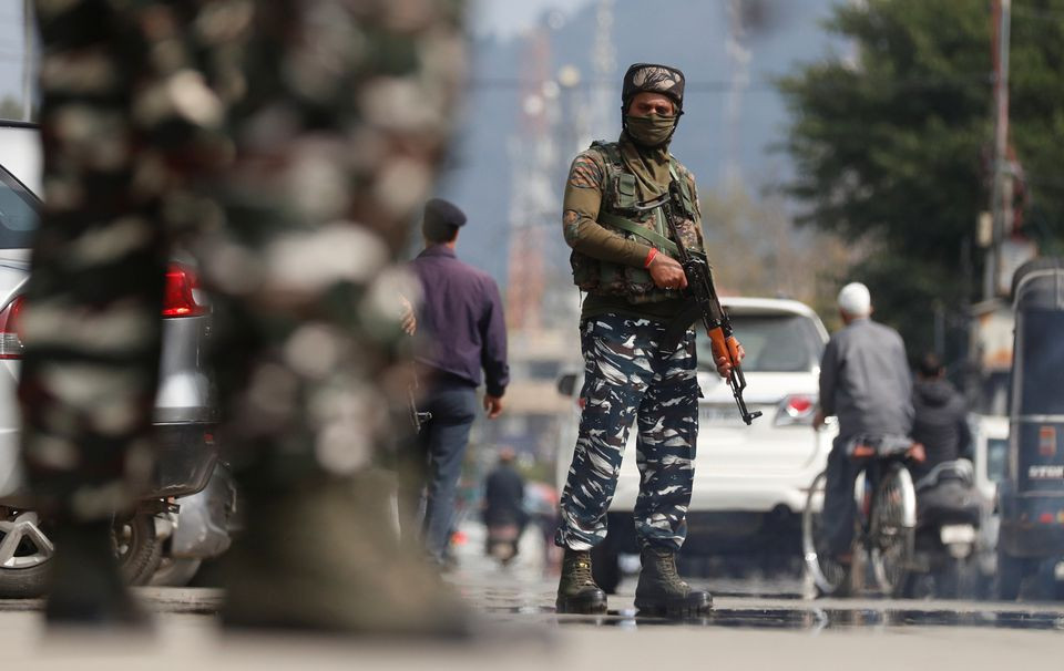 indian central reserve police force crpf personnel stand guard on a street in srinagar october 12 2021 photo reuters