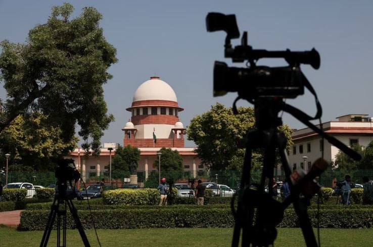 members of media speak in front of cameras outside the premises of the court in new delhi india october 13 2022 photo reuters