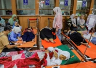 students rest while receiving treatment for food poisoning at the regional general hospital after eating government sponsored free school meals in sidoarjo east java province indonesia september 2 2026 photo reuters