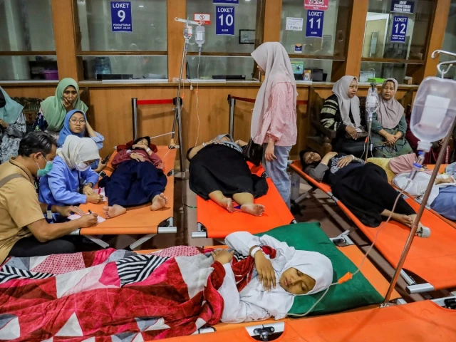 Indonesia's top rights body calls for police to probe poisoning of more than 2,000 students