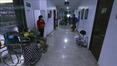 as facilities collapse indonesia doctors must choose among virus patients