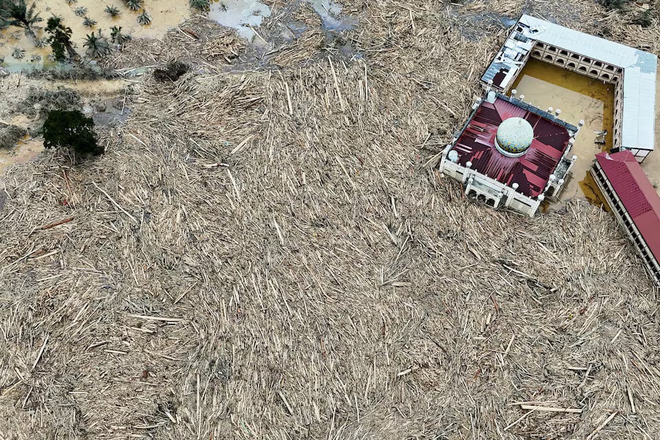 A drone view of Ache area in Indonesia filled with tree logs and unable to reach or walk in the region. PHOTO: REUTERS