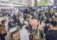 stranded passengers wait at a terminal of soekarno hatta airport in tangerang afp