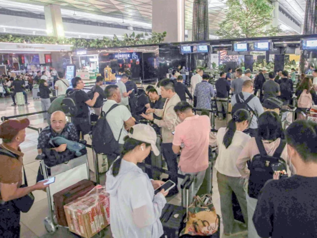stranded passengers wait at a terminal of soekarno hatta airport in tangerang afp stranded passengers wait at a terminal of soekarno hatta airport in tangerang afp