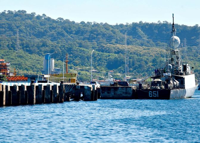 an indonesian navy ship is seen at the navy base port as the search continues for the missing kri nanggala 402 submarine in banyuwangi east java province indonesia april 23 2021 reuters