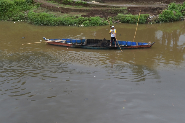 Another man mines sand in the Citarum river in Majalaya, West Java. PHOTO: AFP