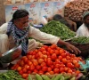 men sell vegetables at their makeshift stalls at the empress market in karachi pakistan reuters filephoto
