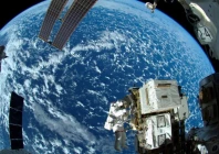 nasa astronaut reid wiseman works outside the space station s quest airlock aboard the international space station photo reuters nasa handout file