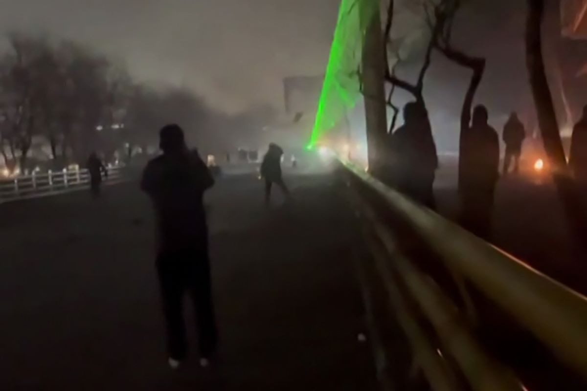 This video grab taken on January 13, 2026 from UGC images posted on social media on January 10, 2026 shows clashes in Mashhad, in northeastern Iran. AFP