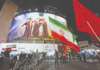 people gather to show support for the new supreme leader of iran at valiasr square in tehran photo reuters