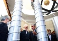 a handout picture provided by the iranian presidency shows president masoud pezeshkian second left and the atomic energy organization of iran chief mohammad eslami second right during the national day of nuclear technology in tehran on april 9 2025 photo afp