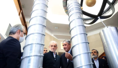 a handout picture provided by the iranian presidency shows president masoud pezeshkian second left and the atomic energy organization of iran chief mohammad eslami second right during the national day of nuclear technology in tehran on april 9 2025 photo afp