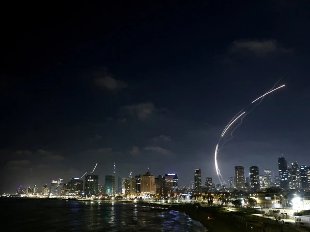 missiles launched from iran can be seen from tel aviv israel june 13 2025 photo reuters missiles launched from iran can be seen from tel aviv israel june 13 2025 photo reuters