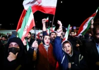 people wave flags as they gather after a two week ceasefire in the us war on iran was announced in tehran iran on april 8 2026 photo reuters