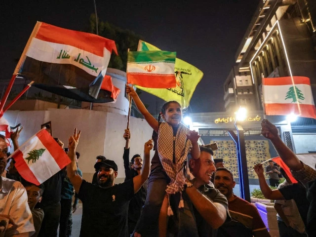people wave the national flags of iraq iran and lebanon as iraqis celebrate in front of the iranian embassy in baghdad on june 24 2025 following a ceasefire between israel and iran israel and iran said on june 24 they had agreed to us president donald trump s proposal for a ceasefire on the 12th day of war between the foes photo afp people wave the national flags of iraq iran and lebanon as iraqis celebrate in front of the iranian embassy in baghdad on june 24 2025 following a ceasefire between israel and iran israel and iran said on june 24 they had agreed to us president donald trump s proposal for a ceasefire on the 12th day of war between the foes photo afp
