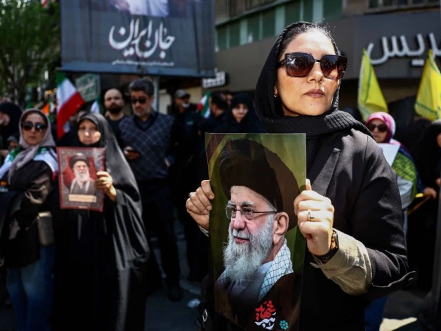 a woman holds a picture of late supreme leader of iran ayatollah ali khamenei during a ceremony in tehran iran 9 april 2026 photo reuters a woman holds a picture of late supreme leader of iran ayatollah ali khamenei during a ceremony in tehran iran 9 april 2026 photo reuters