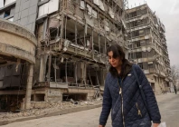 a woman walks on the street following an israeli and u s strike on gandhi hotel hospital amid the u s israel conflict with iran in tehran iran march 2 2026 a woman walks on the street following an israeli and u s strike on gandhi hotel hospital amid the u s israel conflict with iran in tehran iran march 2 2026