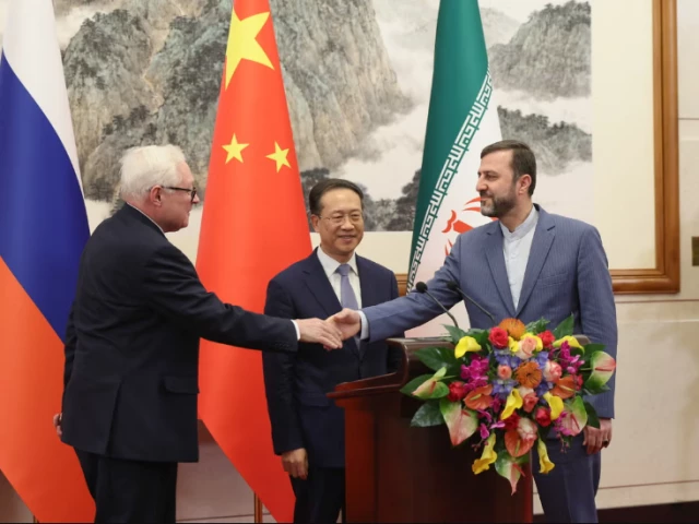 russia s deputy foreign minister sergei ryabkov left with china s vice foreign minister ma zhaoxu and iran s deputy foreign minister kazem gharibabadi hold a press conference after their meeting in beijing on 14 march 2025 photo getty images russia s deputy foreign minister sergei ryabkov left with china s vice foreign minister ma zhaoxu and iran s deputy foreign minister kazem gharibabadi hold a press conference after their meeting in beijing on 14 march 2025 photo getty images
