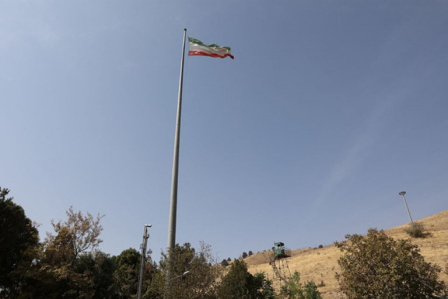 the iranian flag is seen flying over evin prison in tehran iran october 17 2022 photo reuters file the iranian flag is seen flying over evin prison in tehran iran october 17 2022 photo reuters file