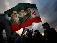 a man holds a flag with a picture of late leader of the islamic revolution ayatollah ruhollah khomeini late supreme leader of iran ayatollah ali khamenei and iran s new supreme leader mojtaba khamenei during a rally in tehran iran april 29 2026 photo reuters file a man holds a flag with a picture of late leader of the islamic revolution ayatollah ruhollah khomeini late supreme leader of iran ayatollah ali khamenei and iran s new supreme leader mojtaba khamenei during a rally in tehran iran april 29 2026 photo reuters file