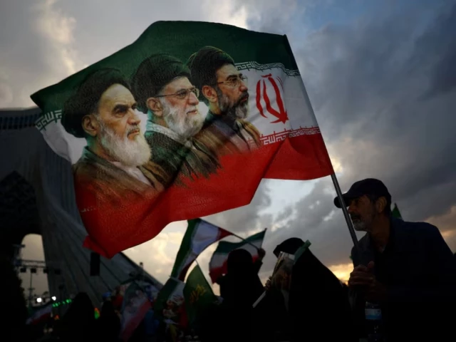 a man holds a flag with a picture of late leader of the islamic revolution ayatollah ruhollah khomeini late supreme leader of iran ayatollah ali khamenei and iran s new supreme leader mojtaba khamenei during a rally in tehran iran april 29 2026 photo reuters file a man holds a flag with a picture of late leader of the islamic revolution ayatollah ruhollah khomeini late supreme leader of iran ayatollah ali khamenei and iran s new supreme leader mojtaba khamenei during a rally in tehran iran april 29 2026 photo reuters file