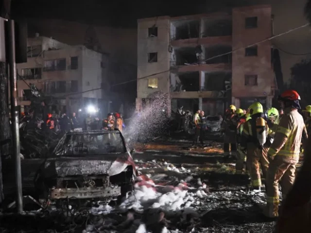 emergency personnel operate after missiles were launched from iran into israel s city of haifa on june 15 2025 photo reuters emergency personnel operate after missiles were launched from iran into israel s city of haifa on june 15 2025 photo reuters