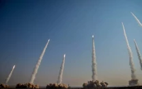 iran condemns us air strikes and warns neighbours against aiding aggression against iran