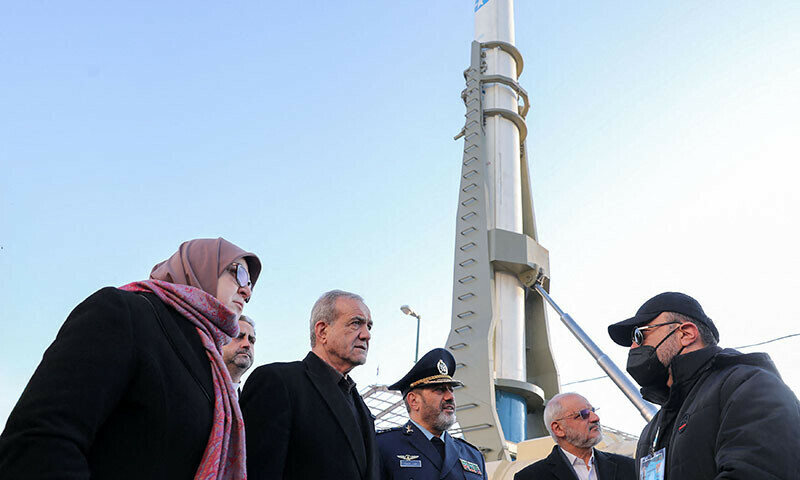 in this handout picture provided by the iranian presidency on february 2 iranian president masoud pezeshkian c visits a defence and space achievements exhibition in tehran photo afp