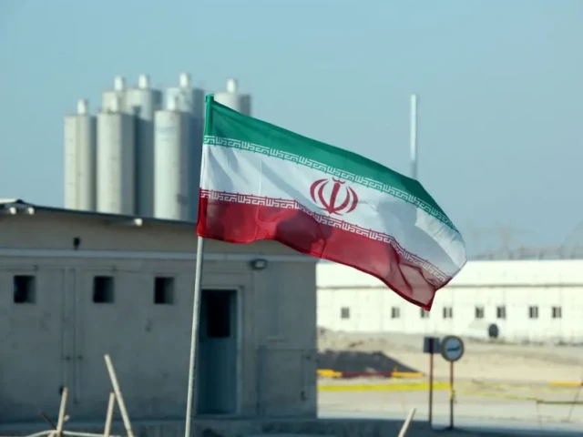 iranian flag in iran s bushehr nuclear power plant on november 10 2019 photo afp