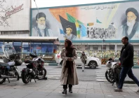 people walk next to a mural with a picture of iran s supreme leader ayatollah ali khamenei on a street in tehran iran february 7 2026 photo reuters