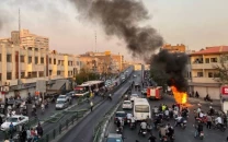 iran unrest intensifies two security personnel killed 30 injured