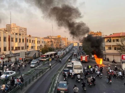 iran unrest intensifies two security personnel killed 30 injured